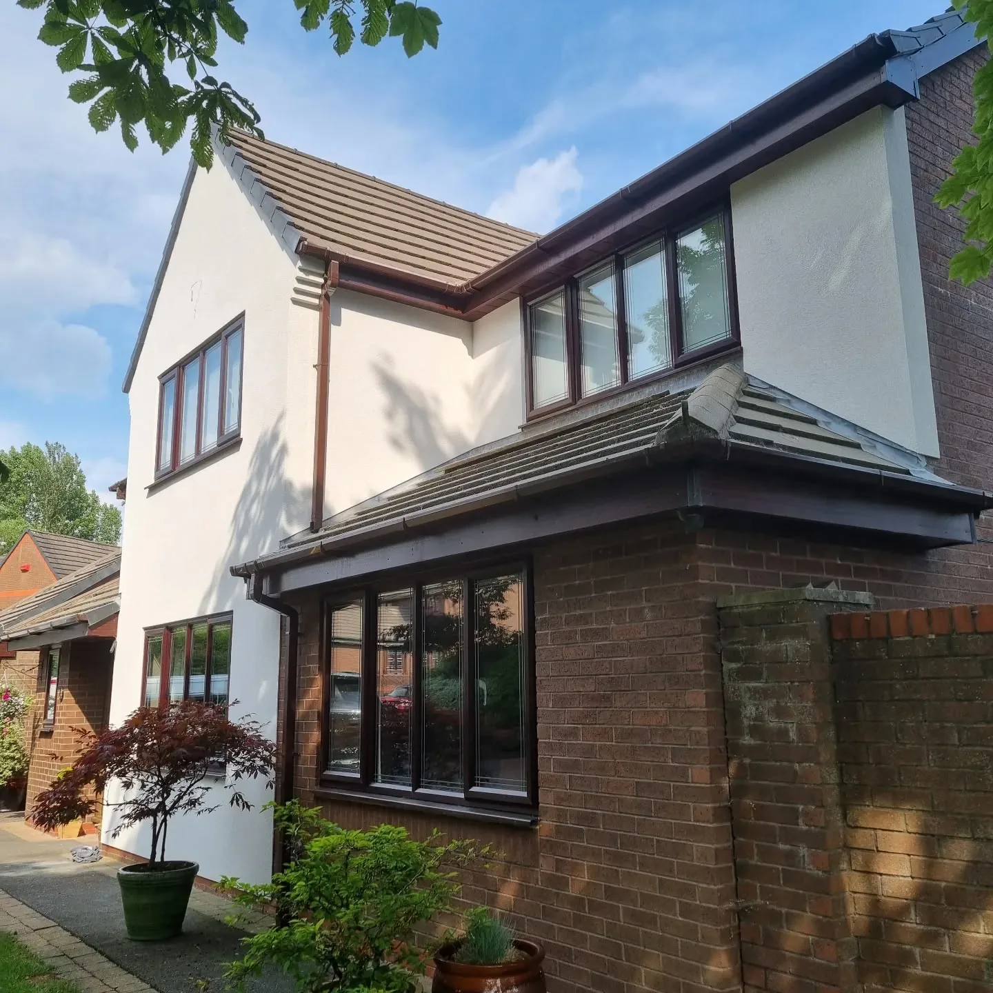Modern detached house in Southport finished in white silicone render